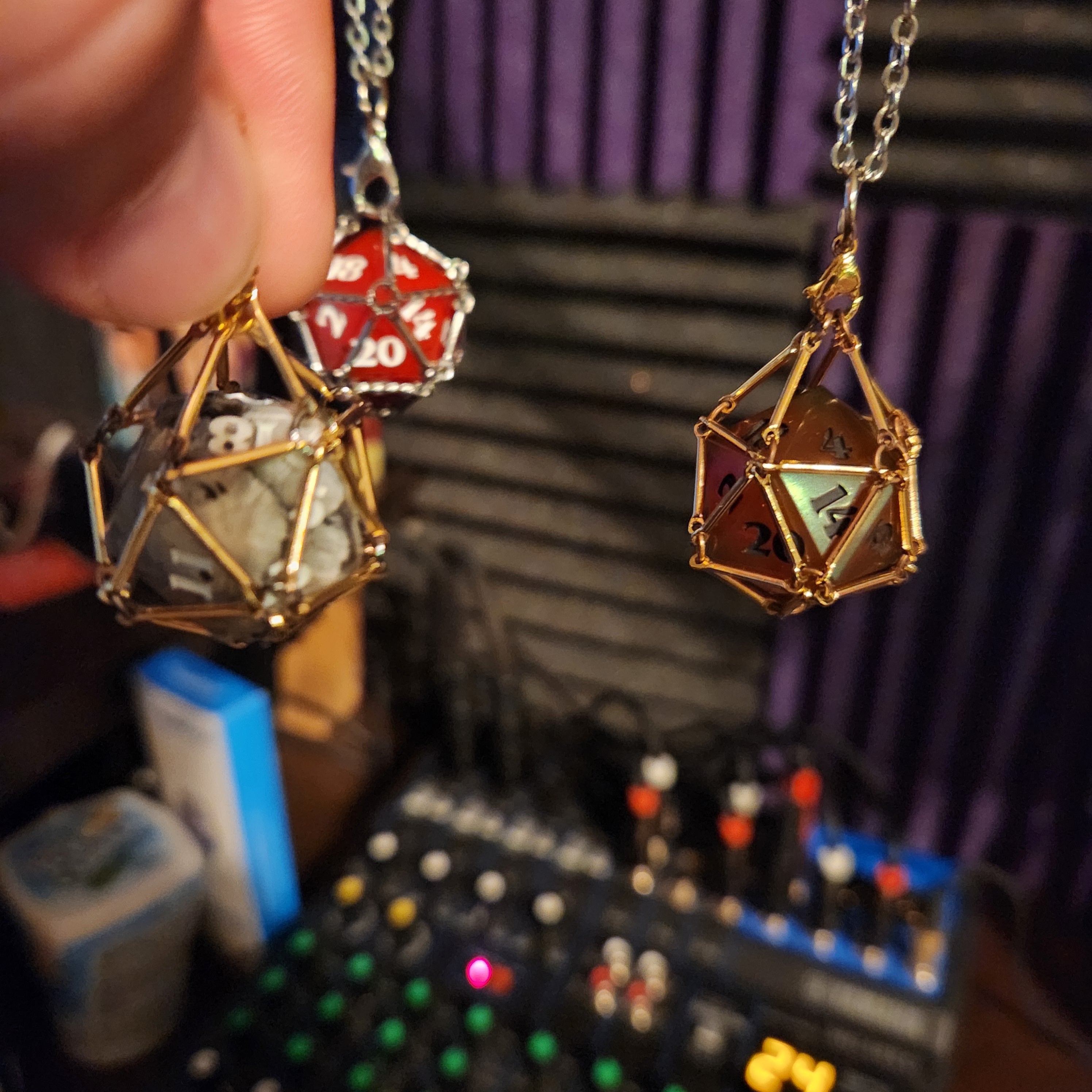 Dice cage necklaces.